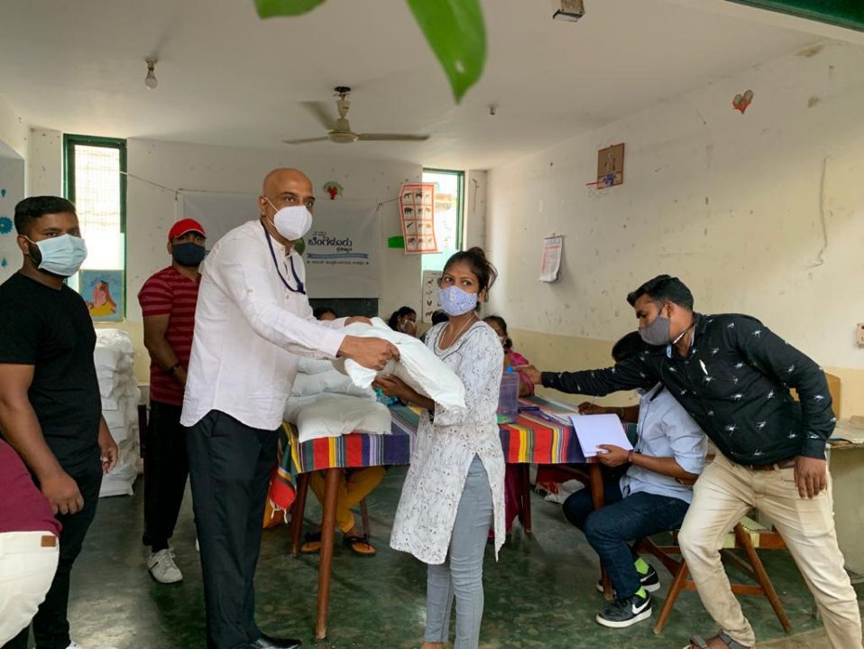 Distribution of 600 Grocery Kits to the residents of Ambedkar Nagar, Old Bypanahalli in association with AVAS 1